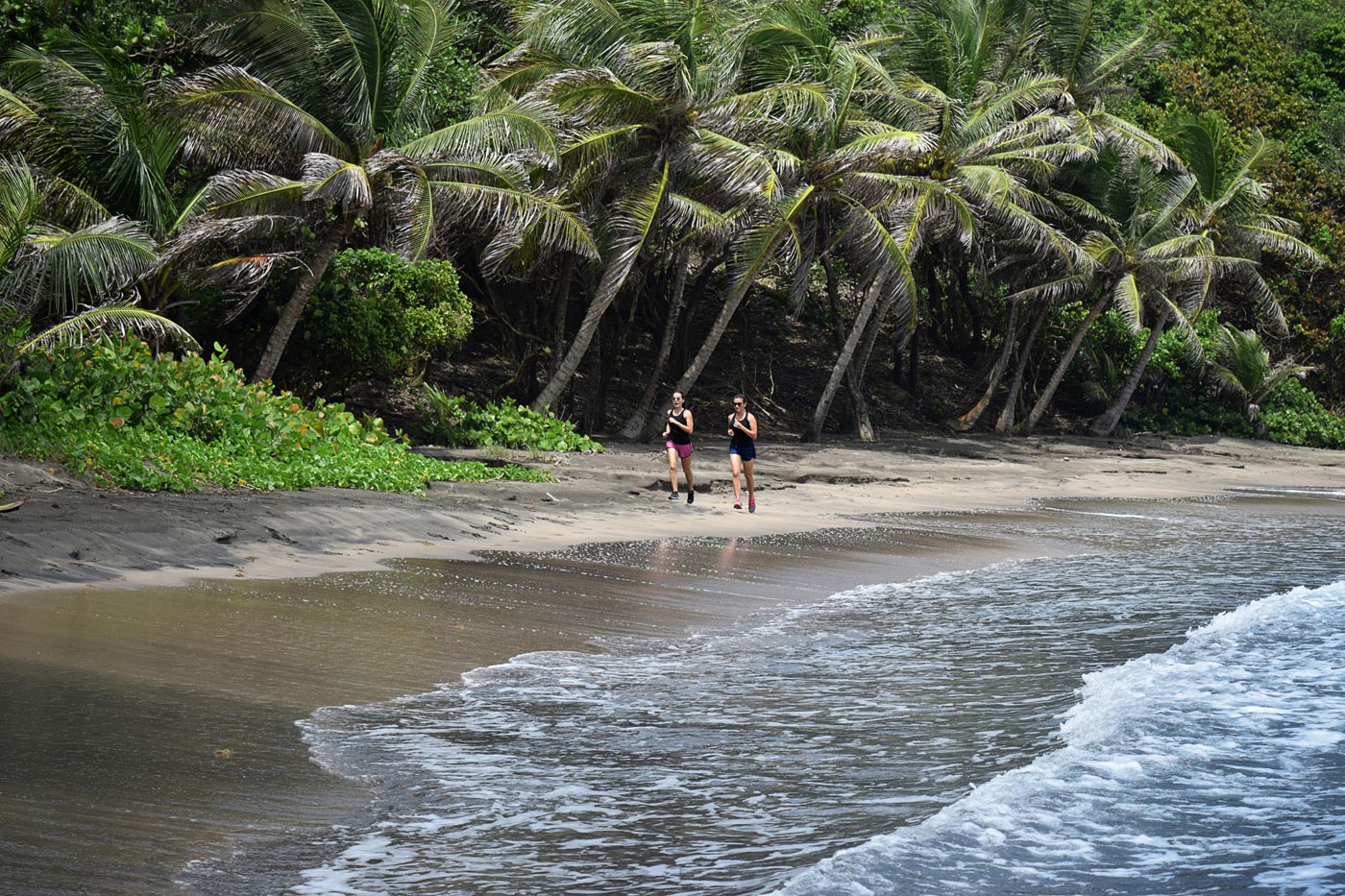 Midst of It bloggers jogging on the beach in St. Vincent. in St. Vincent and The Grenadines in City Style and Living magazine article on 3 adventures south of the equator