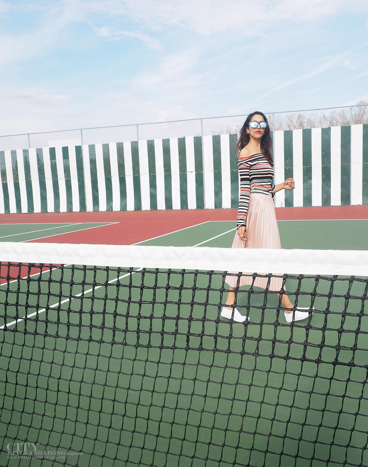 City STyle and Living The Editors Notebook style blogger tennis court topshop metallic skirt, off shoulder free people top, le specs sunglasses and white sneakers walking by net