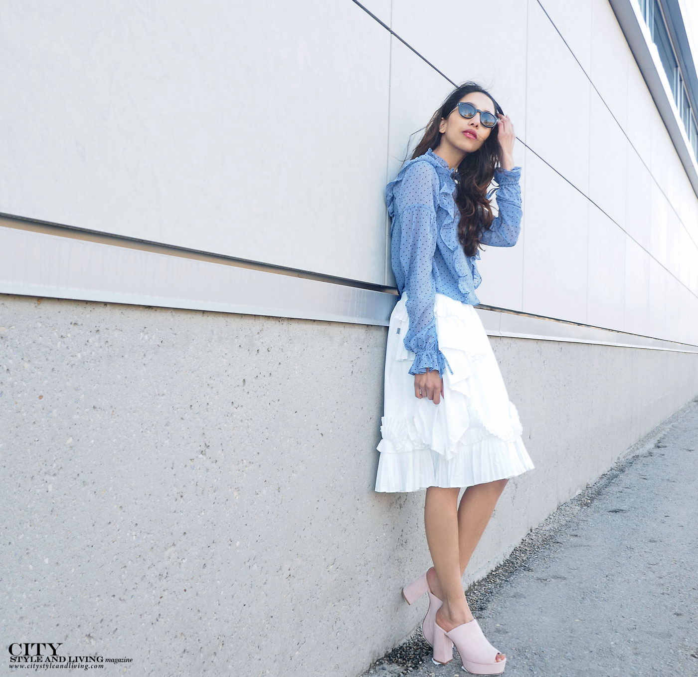 City style and living magazine The Editors Notebook style fashion blogger Shivana Maharaj how to wear frills for spring 2017 standing by wall