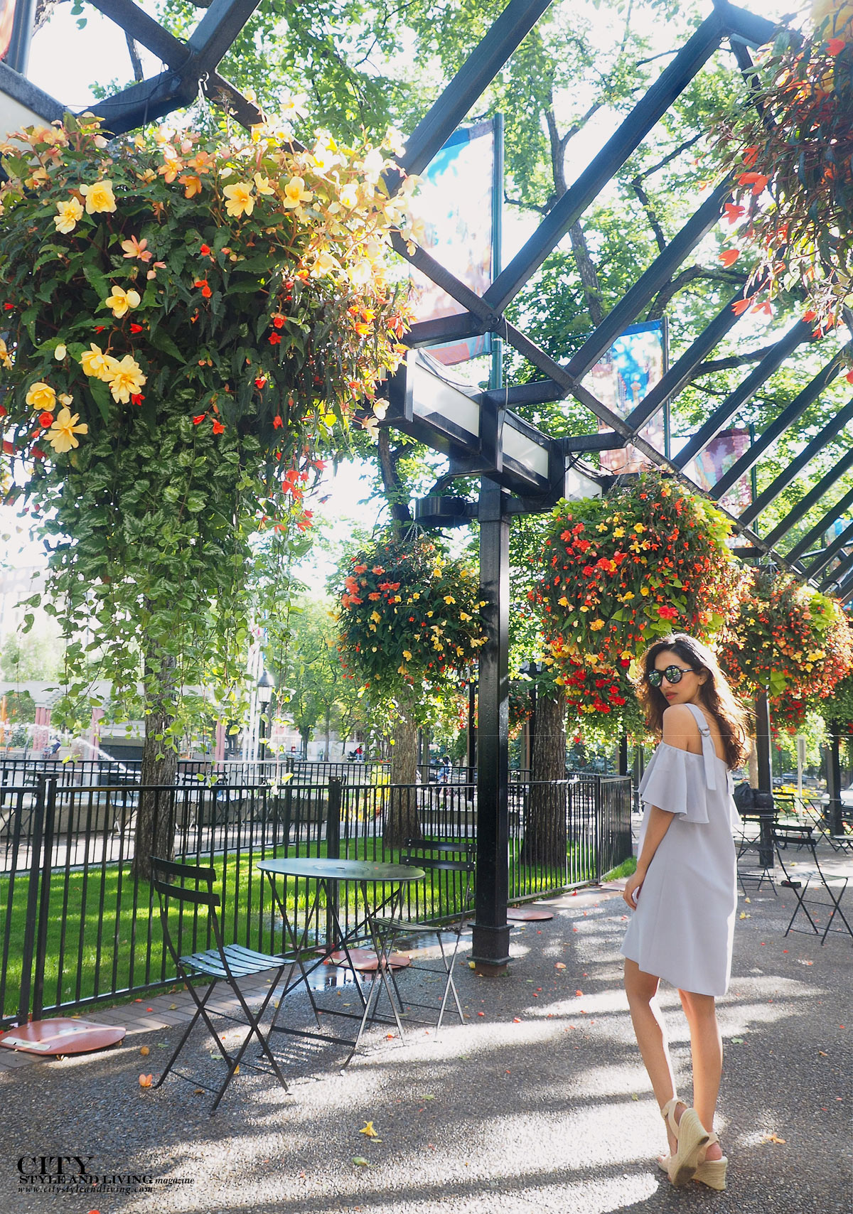 City STyle and Living The Editors Notebook style blogger Downtown Calgary colourful flowers blooming during summer wearing an off shoulder topshop dress and wedges