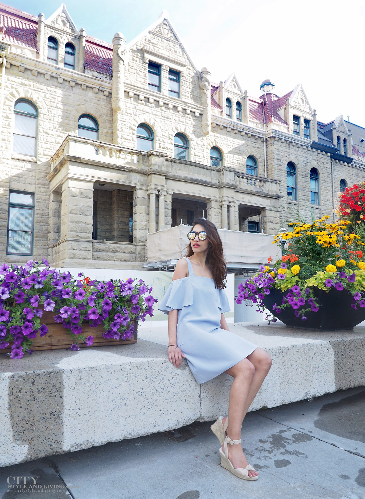City STyle and Living The Editors Notebook style blogger Downtown Calgary colourful flowers blooming during summer wearing an off shoulder topshop dress and wedges