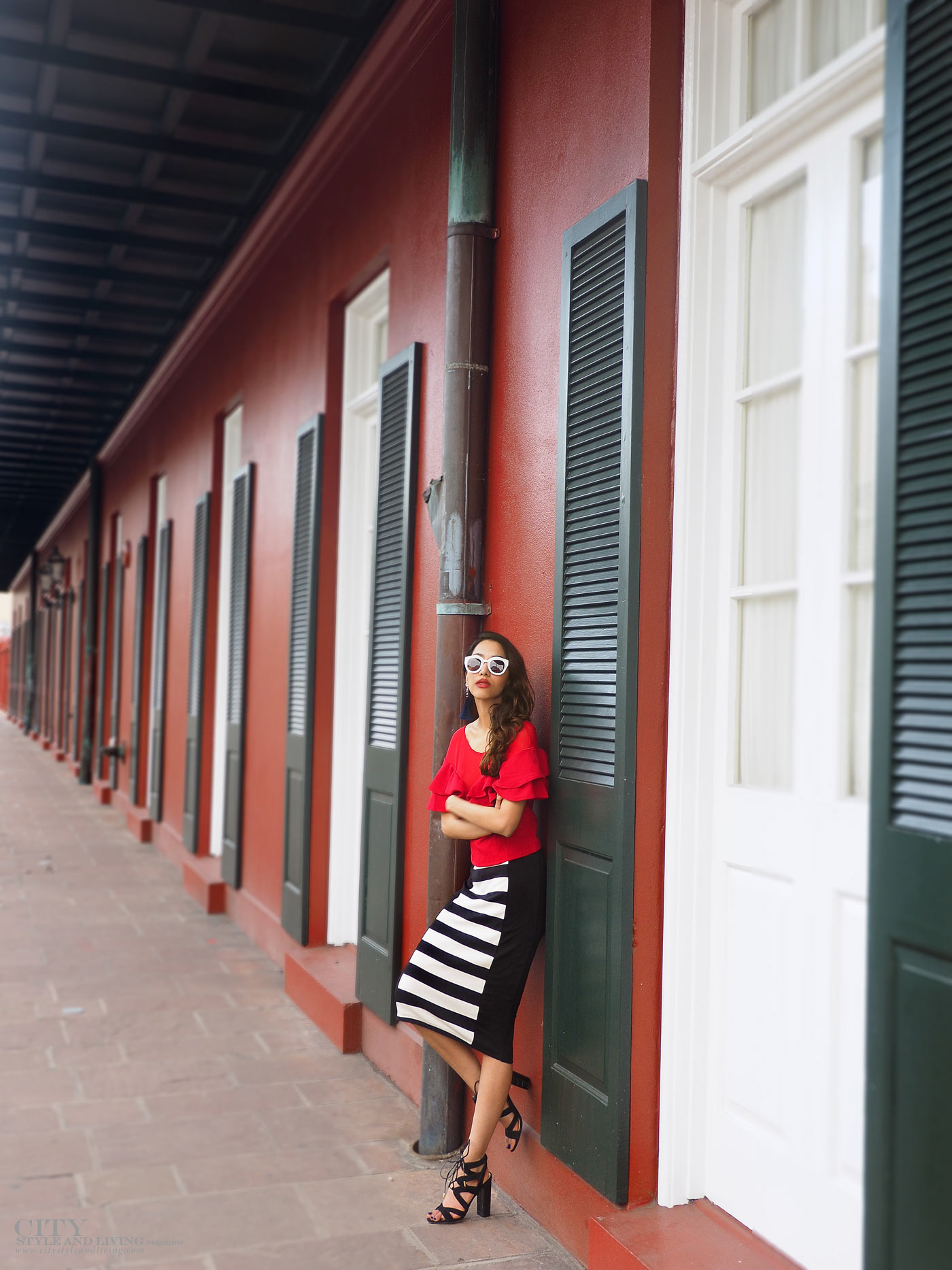 City style and living magazine The Editors Notebook style fashion blogger Shivana Maharaj french quarter new orleans ruffle top and striped skirt